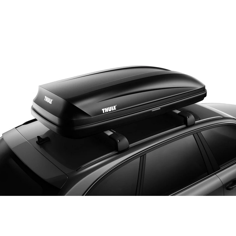 Thule Pulse L cargo box mounted on a car roof rack for extra outdoor storage and travel packing capacity