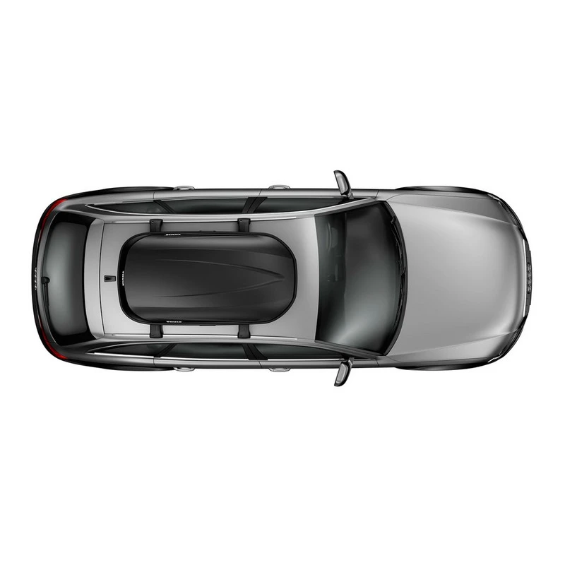 Top view of a silver car with a black Thule Pulse M cargo box mounted on its roof racks.