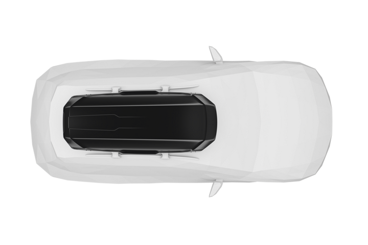 Top view of a white car with a black Thule Motion 3 XL roof cargo box mounted on its roof racks
