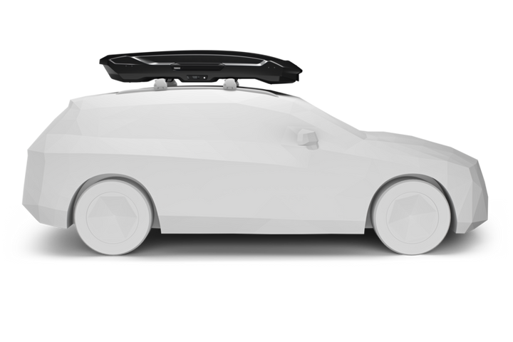 Black Thule Motion 3 XL Low rooftop cargo box mounted on white car side view isolated on white background