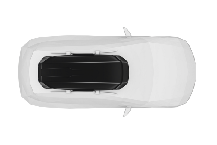 top view of white car with black Thule Motion 3 XL Low roof cargo box installed