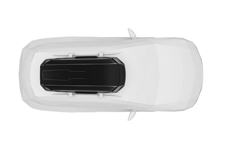 Top view of a white car with a black Thule Motion 3 L roof cargo box mounted on the roof racks.