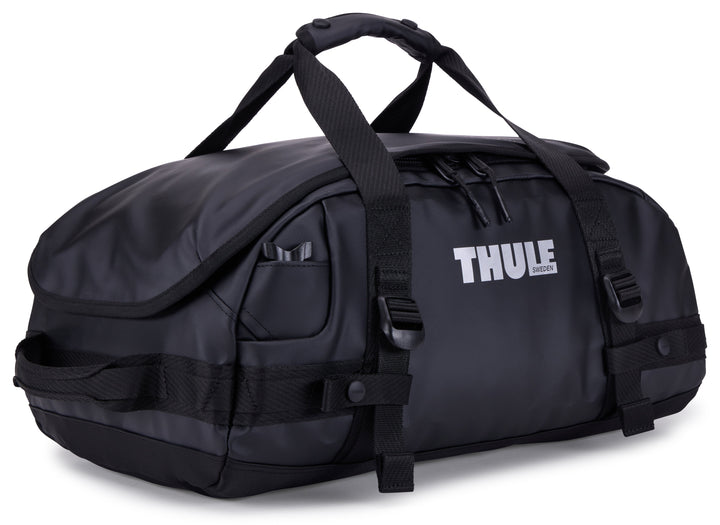 Black Thule duffel bag on a white background