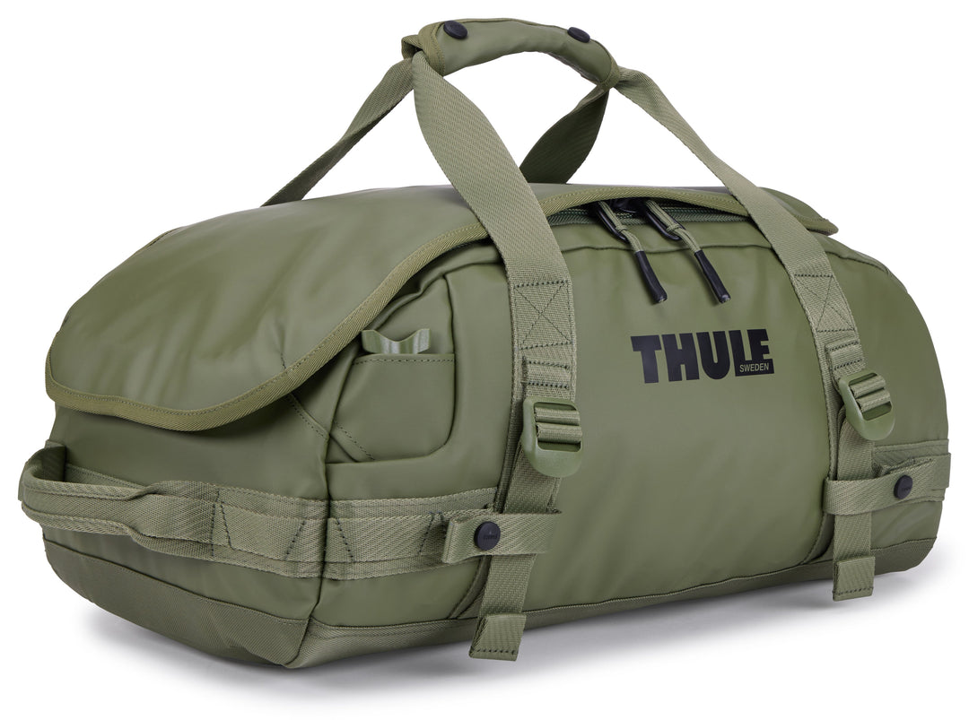Green duffel bag with Thule branding on a white background